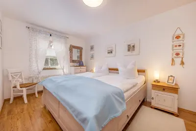 Ein Bett oder Betten in einem Zimmer der Unterkunft FeWo Seaside