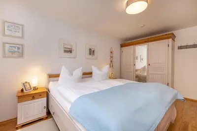 Ein Bett oder Betten in einem Zimmer der Unterkunft FeWo Seaside