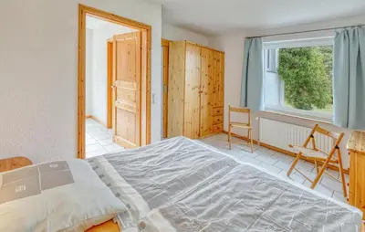 Ein Bett oder Betten in einem Zimmer der Unterkunft Ferienwohnung Pruchten