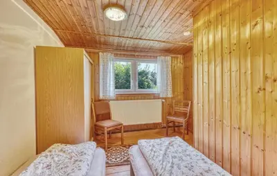 Ein Bett oder Betten in einem Zimmer der Unterkunft Ferienhaus Bodstedt
