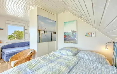 Ein Bett oder Betten in einem Zimmer der Unterkunft Ferienwohnung Fuhlendorf