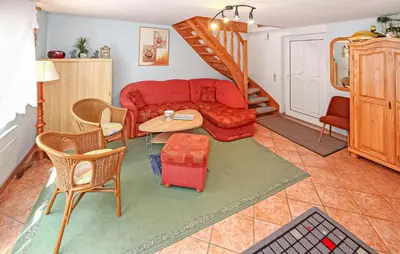 Ein Sitzbereich in der Unterkunft Ferienhaus Saal Ot Hessenburg