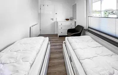 Ein Bett oder Betten in einem Zimmer der Unterkunft Ferienhaus Fuhlendorf