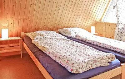 Ein Bett oder Betten in einem Zimmer der Unterkunft Ferienhaus Pruchten