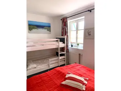 Ein Bett oder Betten in einem Zimmer der Unterkunft Achtern Diek 12c - Wohnung 3
