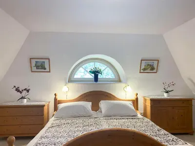 Ein Bett oder Betten in einem Zimmer der Unterkunft Achtern Diek 7b - Wohnung 8