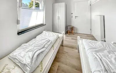 Ein Bett oder Betten in einem Zimmer der Unterkunft Ferienhaus Fuhlendorf