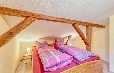 Ein Bett oder Betten in einem Zimmer der Unterkunft Ferienwohnung Bodstedt