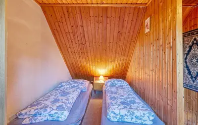 Ein Bett oder Betten in einem Zimmer der Unterkunft Ferienhaus Bodstedt