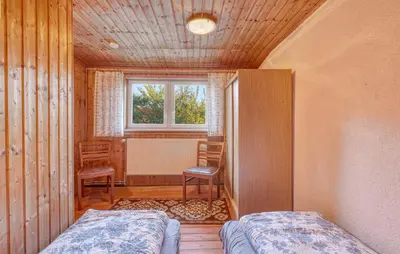 Ein Bett oder Betten in einem Zimmer der Unterkunft Ferienhaus Bodstedt