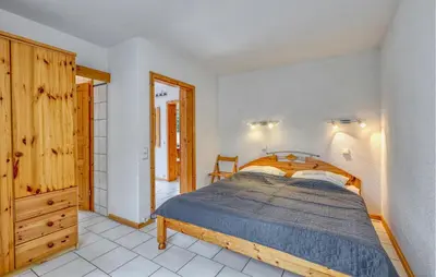 Ein Bett oder Betten in einem Zimmer der Unterkunft Ferienwohnung Pruchten