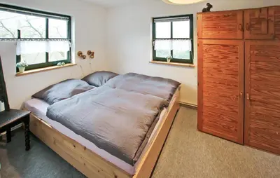 Ein Bett oder Betten in einem Zimmer der Unterkunft Ferienhaus Barth