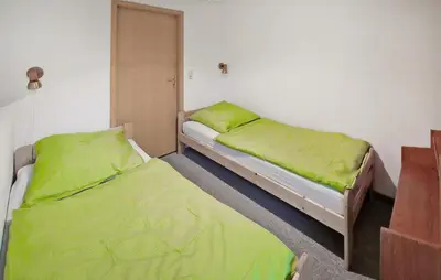 Ein Bett oder Betten in einem Zimmer der Unterkunft Ferienhaus Barth