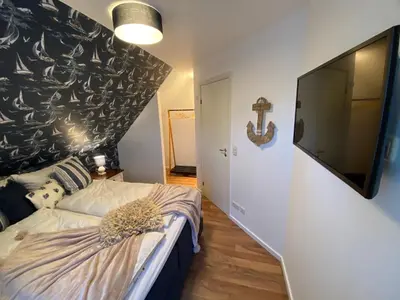 Ein Bett oder Betten in einem Zimmer der Unterkunft Villa Gudrun, luxury Beach House