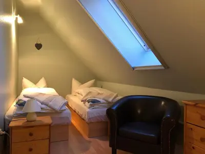 Ein Bett oder Betten in einem Zimmer der Unterkunft Ferienhaus mit Sauna b