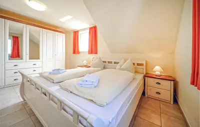 Ein Bett oder Betten in einem Zimmer der Unterkunft Ferienwohnung Fuhlendorf