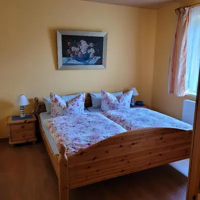 Ein Bett oder Betten in einem Zimmer der Unterkunft Ferienwohnung 