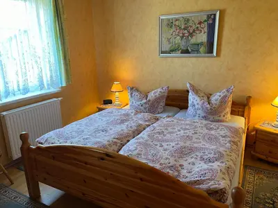 Ein Bett oder Betten in einem Zimmer der Unterkunft Ferienwohnung 