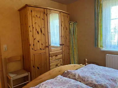 Ein Bett oder Betten in einem Zimmer der Unterkunft Ferienwohnung 