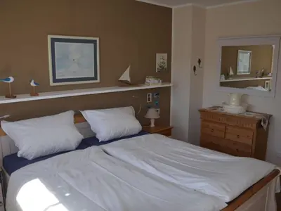 Ein Bett oder Betten in einem Zimmer der Unterkunft House Pella Modern retreat