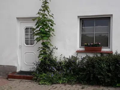 Ein Garten an der Unterkunft Ferienwohnungen in der Vinetastadt Barth