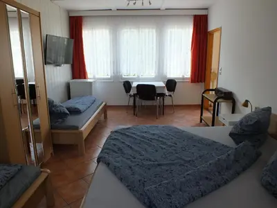 Ein Bett oder Betten in einem Zimmer der Unterkunft Bungalow 1