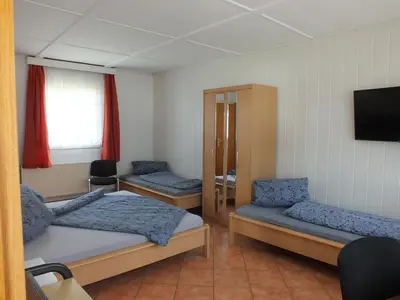 Ein Bett oder Betten in einem Zimmer der Unterkunft Bungalow 1