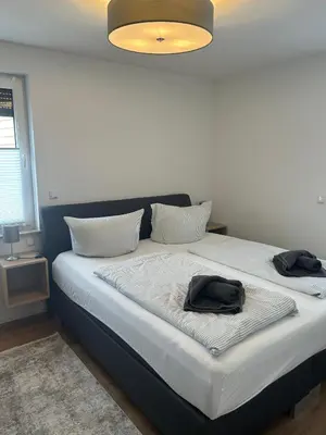 Ein Bett oder Betten in einem Zimmer der Unterkunft Ostseemöwe NEU