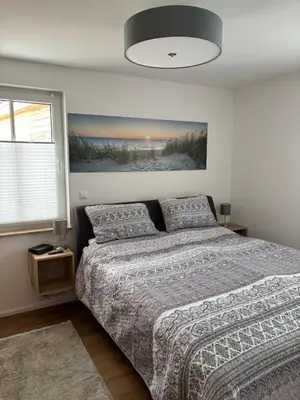 Ein Bett oder Betten in einem Zimmer der Unterkunft Ostseemöwe NEU