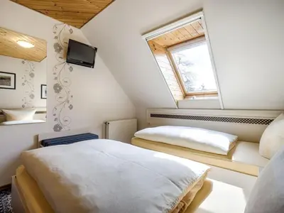 Ein Bett oder Betten in einem Zimmer der Unterkunft Am Rotdorn Modern retreat