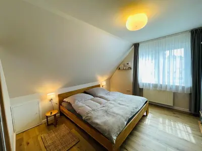 Ein Bett oder Betten in einem Zimmer der Unterkunft Prerower Ferienwohnung