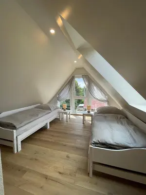 Ein Bett oder Betten in einem Zimmer der Unterkunft Prerower Ferienwohnung