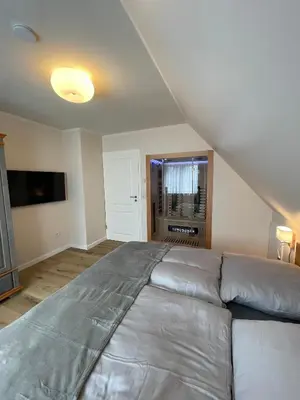 Ein Bett oder Betten in einem Zimmer der Unterkunft Prerower Ferienwohnung