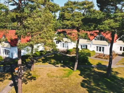 Ein Garten an der Unterkunft House behind the dunes