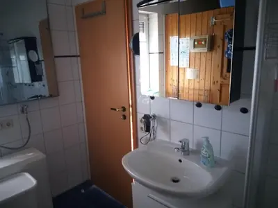 Ein Badezimmer in der Unterkunft Haus am Bodden
