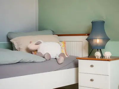 Ein Bett oder Betten in einem Zimmer der Unterkunft Haus Ostseezwilling 1