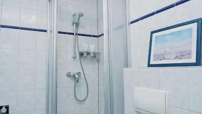 Ein Badezimmer in der Unterkunft Achtern Diek 12b - Wohnung 1
