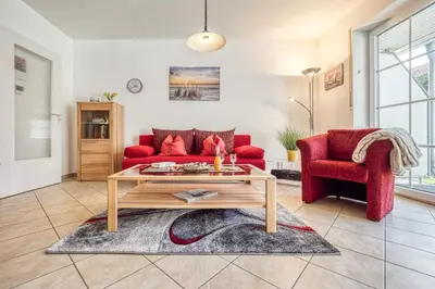 Ein Sitzbereich in der Unterkunft Haus Kranich 4 - Wohnung 17