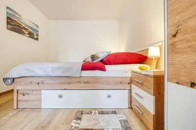 Ein Bett oder Betten in einem Zimmer der Unterkunft Haus Kranich 4 - Wohnung 17
