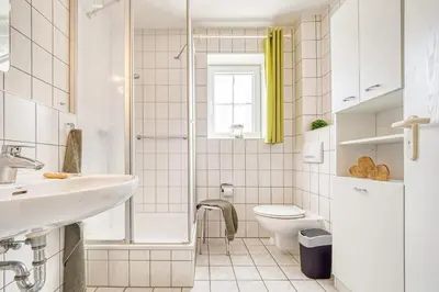 Ein Badezimmer in der Unterkunft Haus Kranich 4 - Wohnung 17