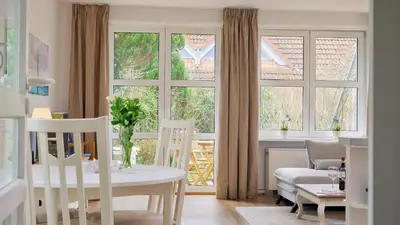 Ein Sitzbereich in der Unterkunft Kapitänsgarten Wohnung 25