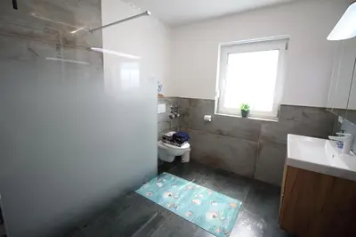 Ein Badezimmer in der Unterkunft Deichperle-modern & ruhige Lage