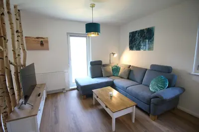 Ein Sitzbereich in der Unterkunft Deichperle-modern & ruhige Lage