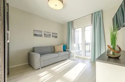 Ein Sitzbereich in der Unterkunft 5 Sterne Ferienwohnung Strandblick