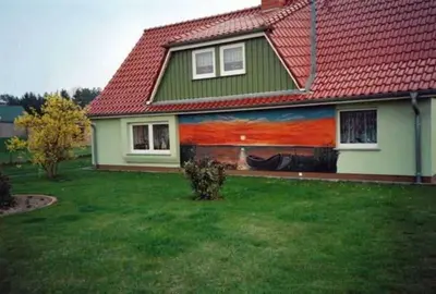 Ein Garten an der Unterkunft Ferienwohnung Sonnenuntergang