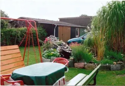 Ein Garten an der Unterkunft Ferienwohnung Sonnenuntergang
