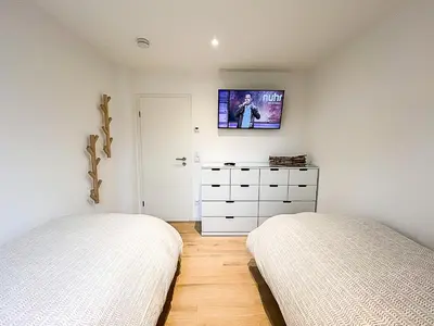Ein Bett oder Betten in einem Zimmer der Unterkunft Meer genießen - Fewo Surfside