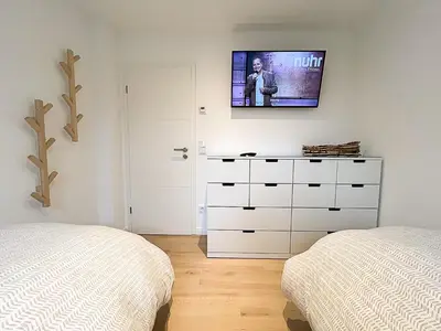 Ein Bett oder Betten in einem Zimmer der Unterkunft Meer genießen - Fewo Surfside