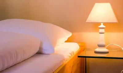 Ein Bett oder Betten in einem Zimmer der Unterkunft Haus zu den Büschen 02