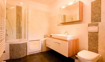 Ein Badezimmer in der Unterkunft Haus zu den Büschen 03